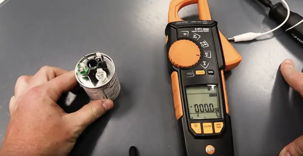 how to discharge a capacitor with a multimeter